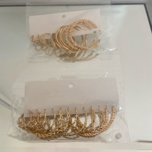 12 pairs of gold hoops
